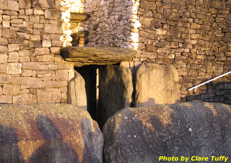 The Newgrange entrance illuminated by the rising sun on December 22nd